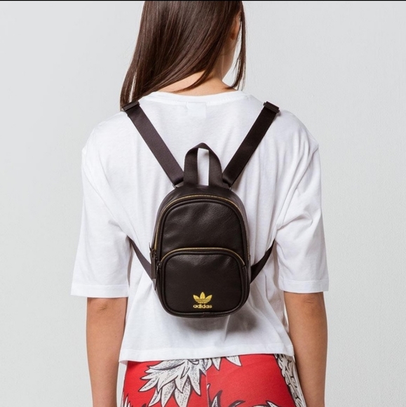 Adidas mini backpack faux leather black gold color adjustable straps
